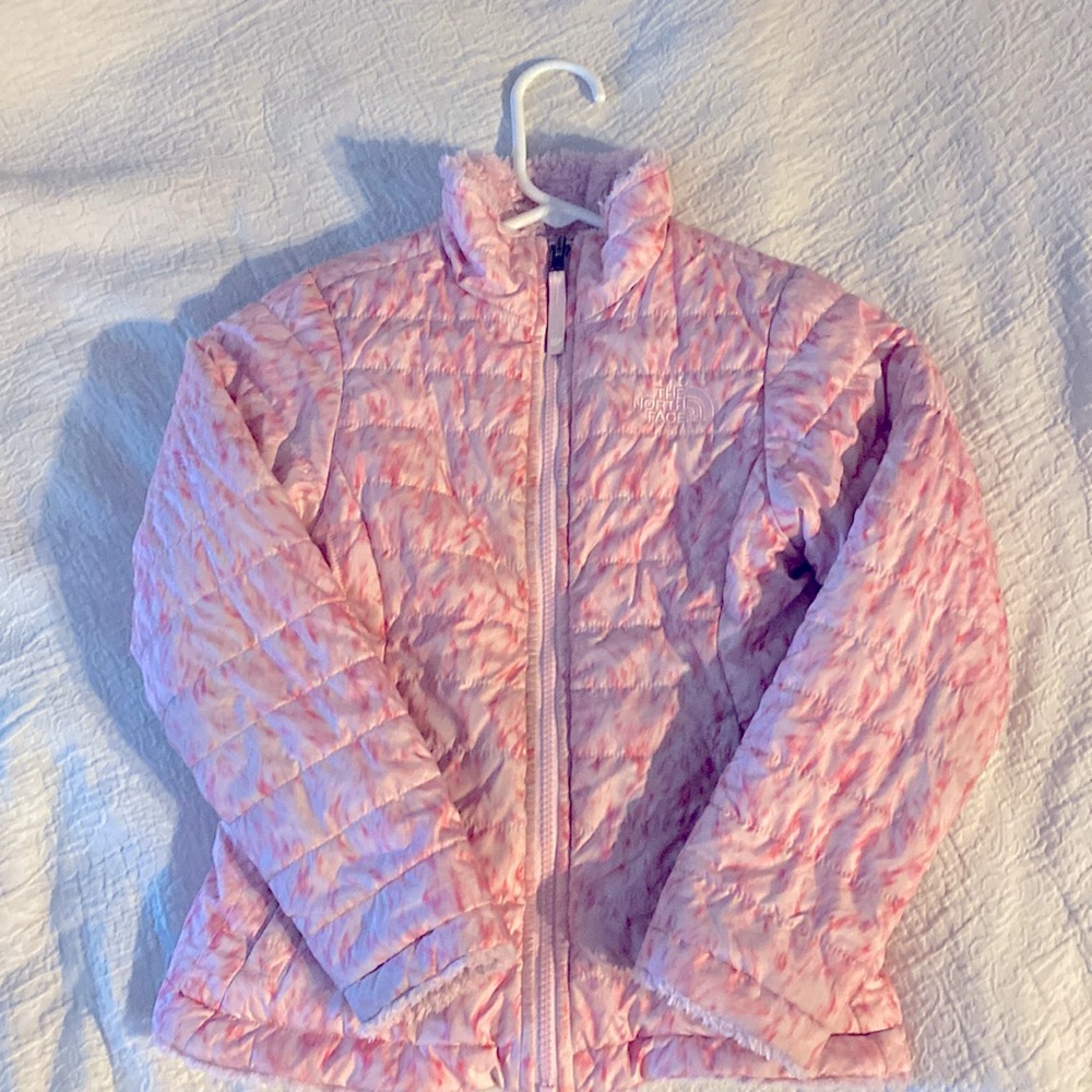 Girl’s Pink Reversible North Face Winter Coat.